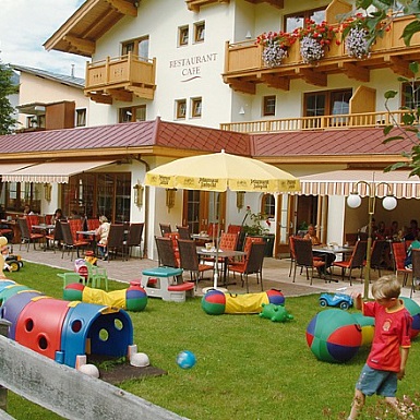 Terrace and garden area with playground